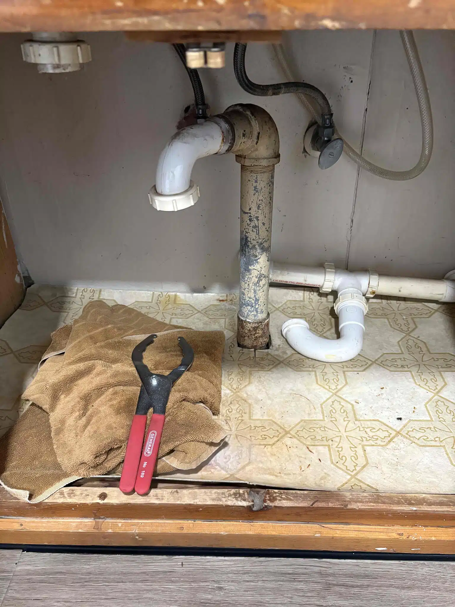 Kitchen P-Trap Before Drain Line Repair Leaking kitchen sink p-trap before drain line repair