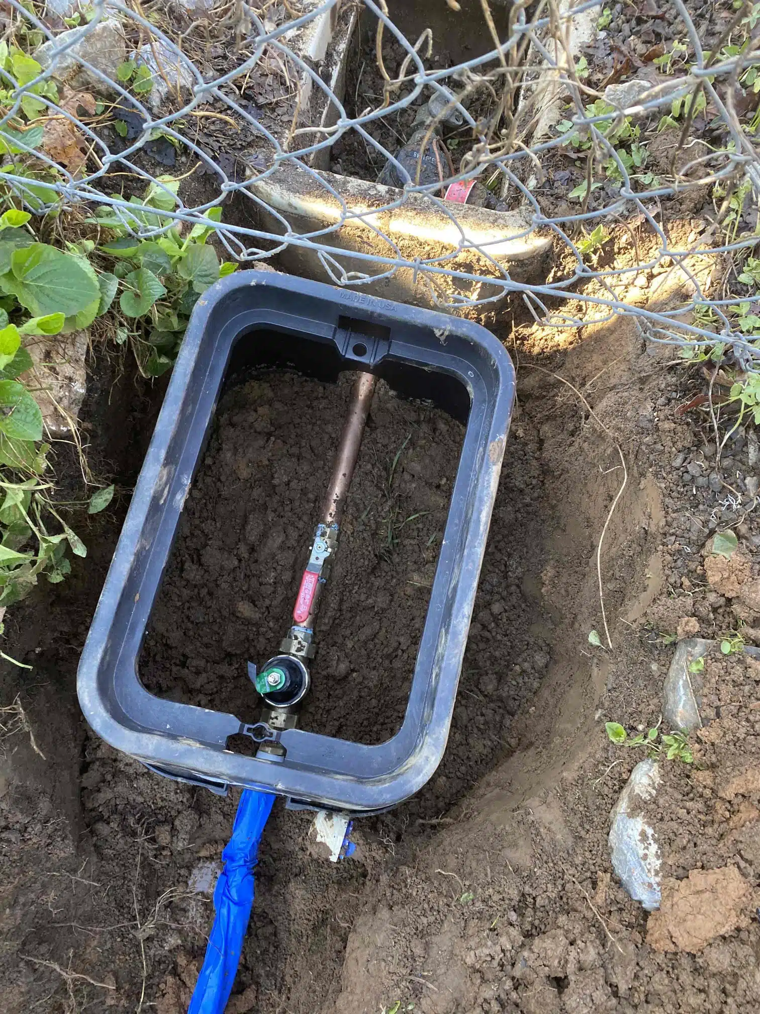 New Pressure Regulator and Shut-Off Valve During Water Line Replacement Water line replacement with new pressure regulator and shut-off valve connected near city meter