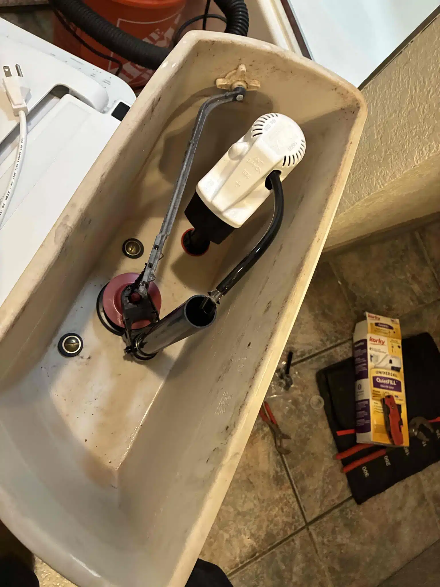 Replacing toilet flush valve and flapper during toilet repair by Earl's Plumbing