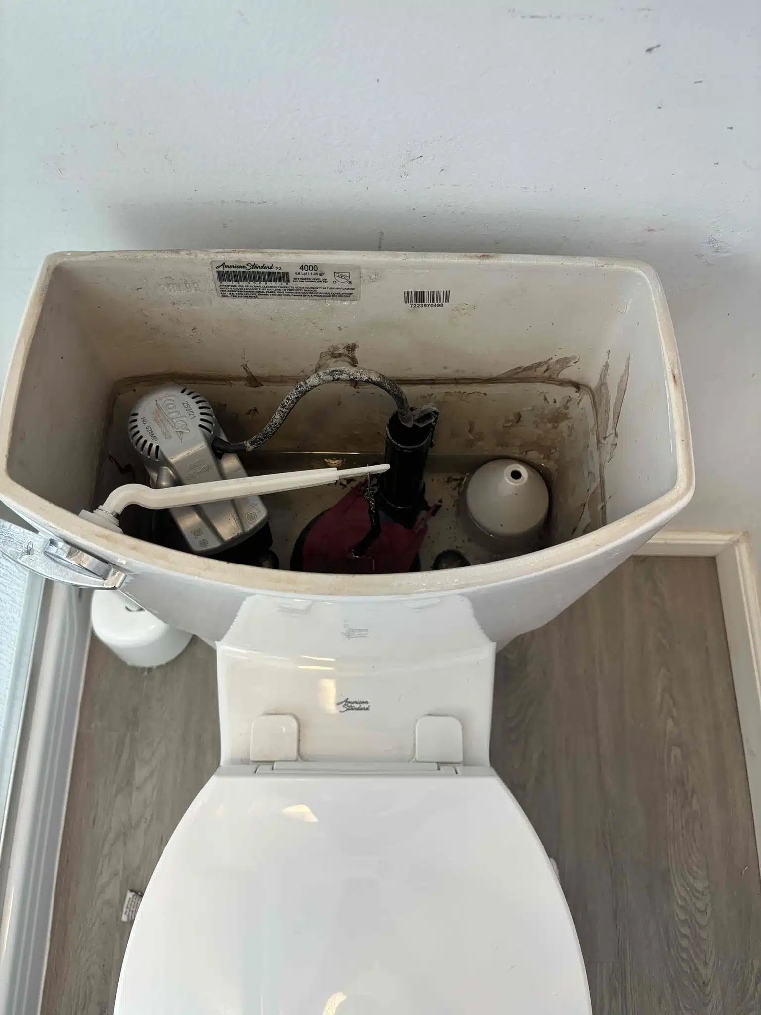 Old toilet before replacement by Earl's Plumbing in Chico