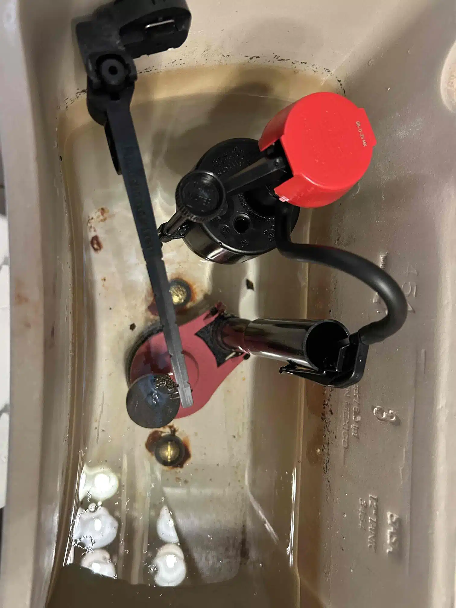 After photo of new style toilet flush valve installed by Earl's Plumbing in Yuba City